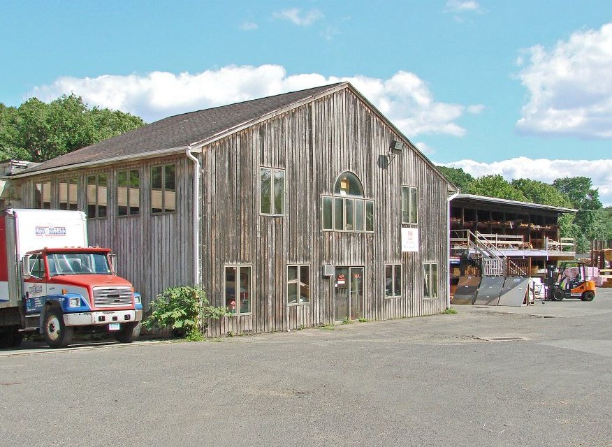 Old wooden building that is the Meriden, Conneticut building for Lyon and Billard store